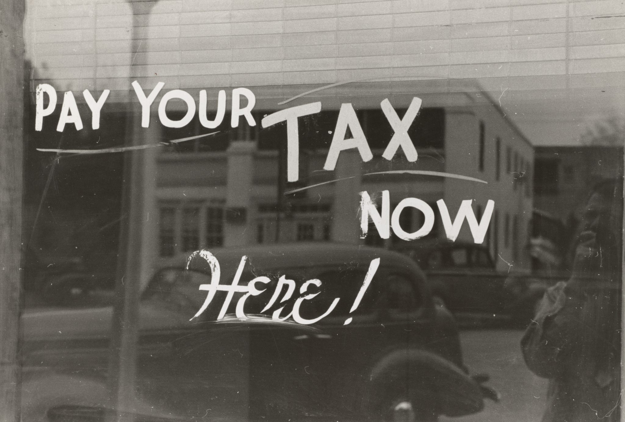 pay taxes sign